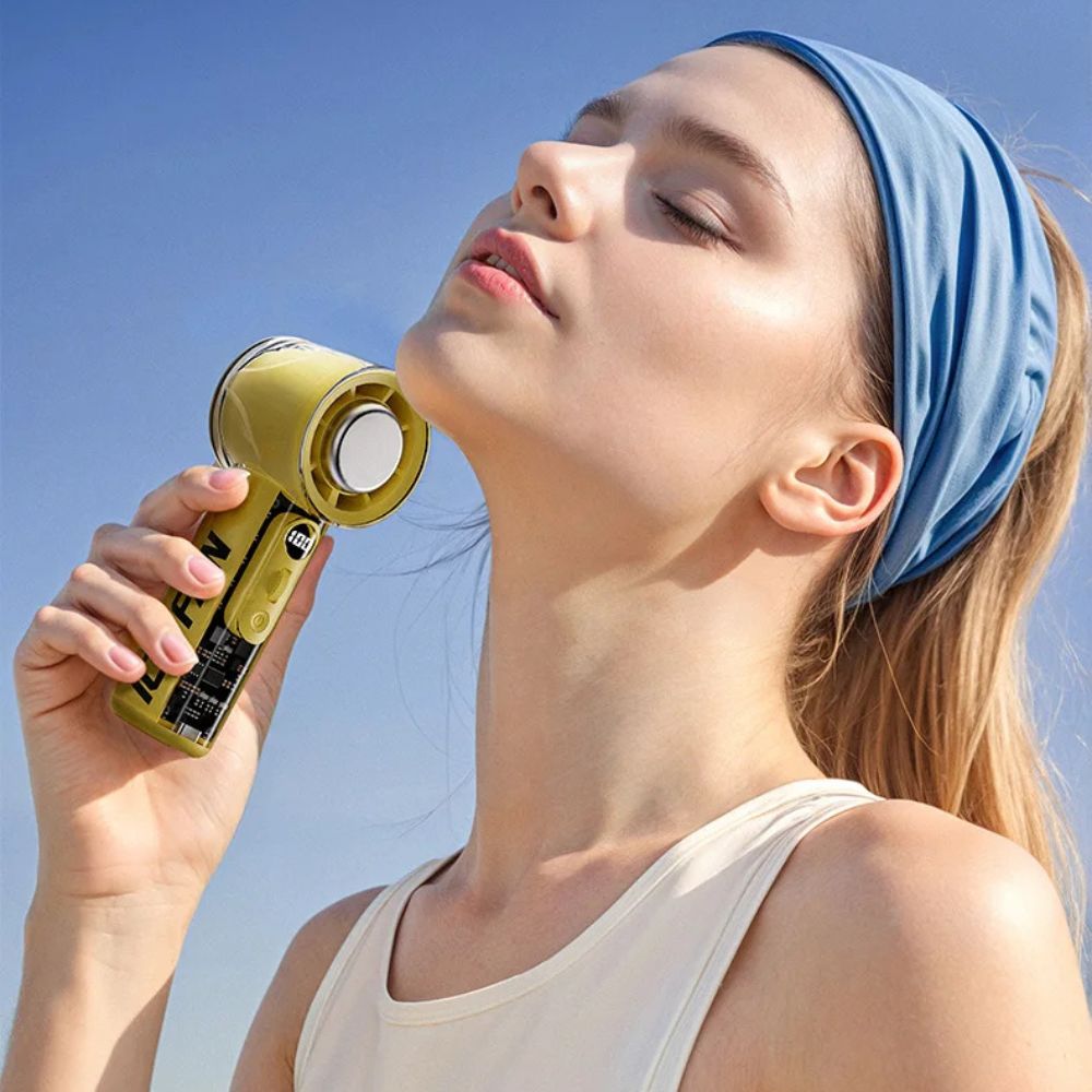 BreezeBuddy™ Handheld Misting Fan - Best Mini Portable Fan for Personal Cooling